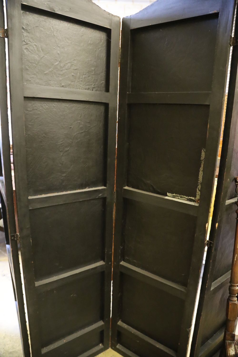 A Dutch leather four fold screen, c.1860, each panel 49cm x 203cm